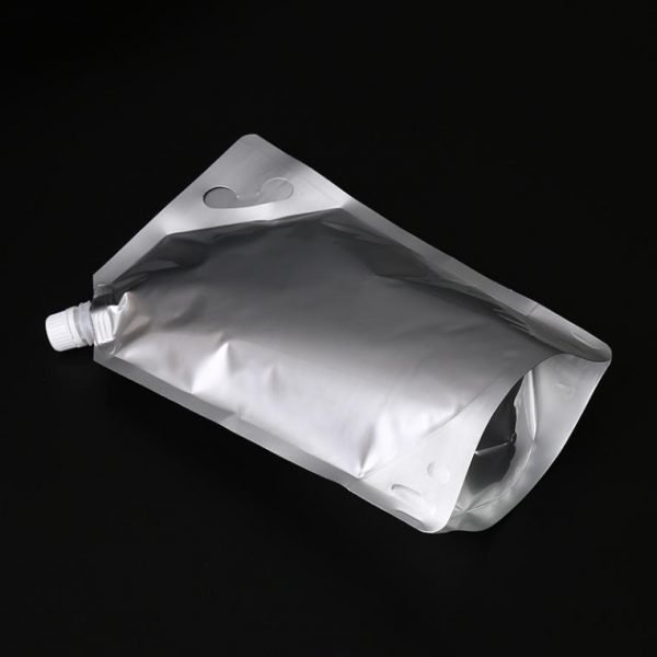 Spouted stand up barrier pouches